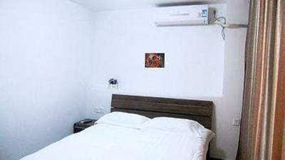 фото отеля Hongma Apartment