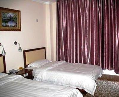 фото отеля Jiujiu Business Hotel
