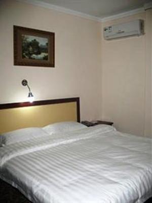 фото отеля Jiujiu Business Hotel