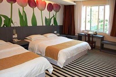 фото отеля Xiamen Qingnian Yangguang Hotel Wenzaodian
