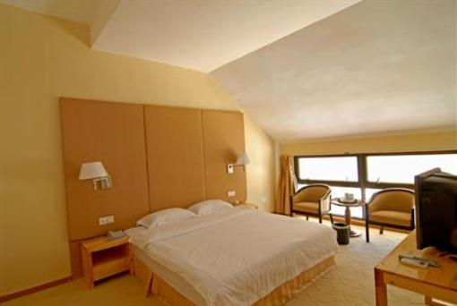 фото отеля Qingao Peninsula Holiday Hotel