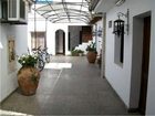 фото отеля Hostal El Palo Santo
