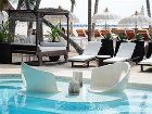 фото отеля El Taj Oceanfront & Beachside Condo Hotel