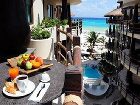 фото отеля El Taj Oceanfront & Beachside Condo Hotel