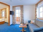 фото отеля Hotel Huttenwirt Huttschlag