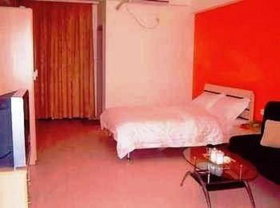 фото отеля Qingyi Apartment Hotel Xiamen