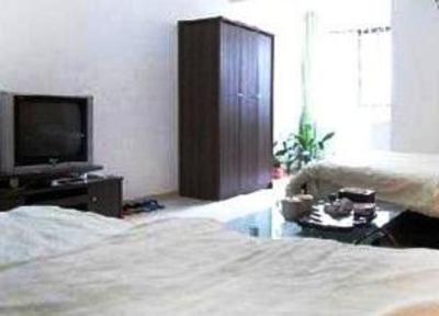 фото отеля Qingyi Apartment Hotel Xiamen