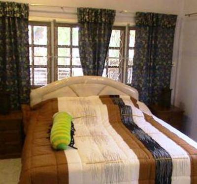 фото отеля Mangoes Guesthouse