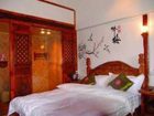 фото отеля Lijiang Qiwei Life Courtyard Inn