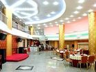 фото отеля Qingdao Huaneng Hotel
