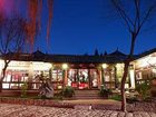фото отеля Zhengfu Caotang Inn Shuxiangmendi Lijiang