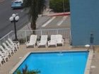 фото отеля Coastal Palms Inn and Suites
