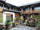 фото отеля Zhongyi Inn Lijiang Xiangshuyuan Courtyard Hotel
