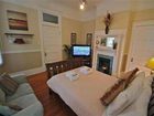 фото отеля Savannah Dream Vacations - 508 East Waldburg Street