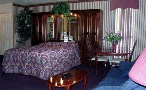 фото отеля Winnie Inn & Suites