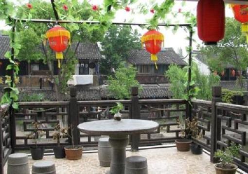 фото отеля Yuan's Inn Xitang