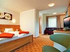 фото отеля Erlebnis Hotel Appartements Latschach