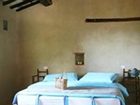фото отеля Follonico 4 Suite Bed & Breakfast Torrita di Siena