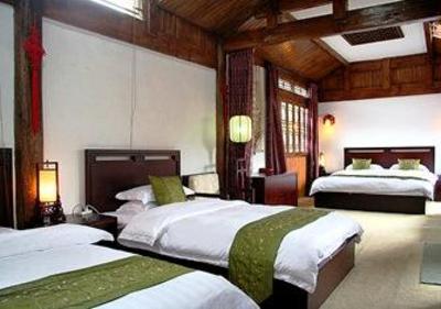 фото отеля Bashilai Inn Lijiang Bayi