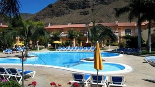 фото отеля Apartamentos Jardin del Conde