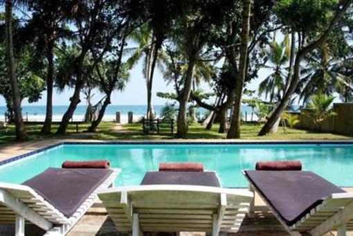 фото отеля Manahara Beach Cottage & Cabanas