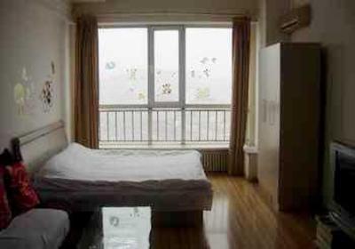 фото отеля Tianxing Luosifu Apartment