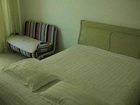 фото отеля Tianxing Luosifu Apartment