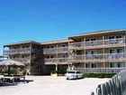фото отеля Beachgate CondoSuites and Motel