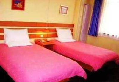 фото отеля Home Inn Dalian Haiwan Square