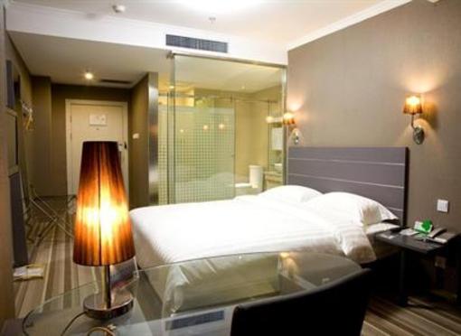 фото отеля Kunlun Leju Business Hotel Zhengzhou Bus North Station