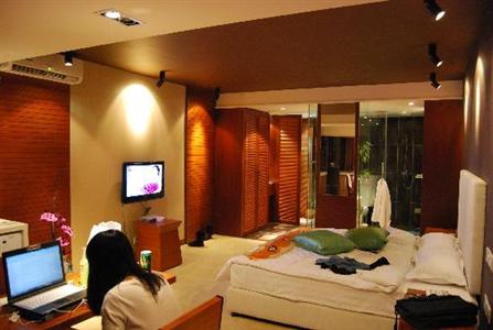 фото отеля Jinguan Impression Apartment Hotel
