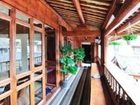 фото отеля Lijiang Bicycle and Sword Inn - Happy Inn